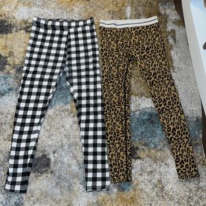 Forever 21 leggings. 2 pair of leggings. Leopard print and checkerboard. Size L